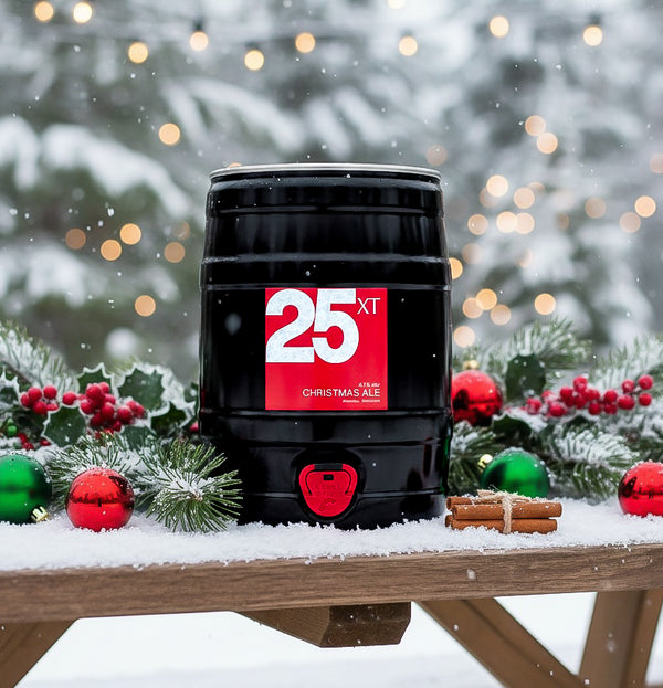 XT Brewing Co XT25 Christmas Ale Black 5-Litre Mini-Can with a snowy Christmasy backdrop. 